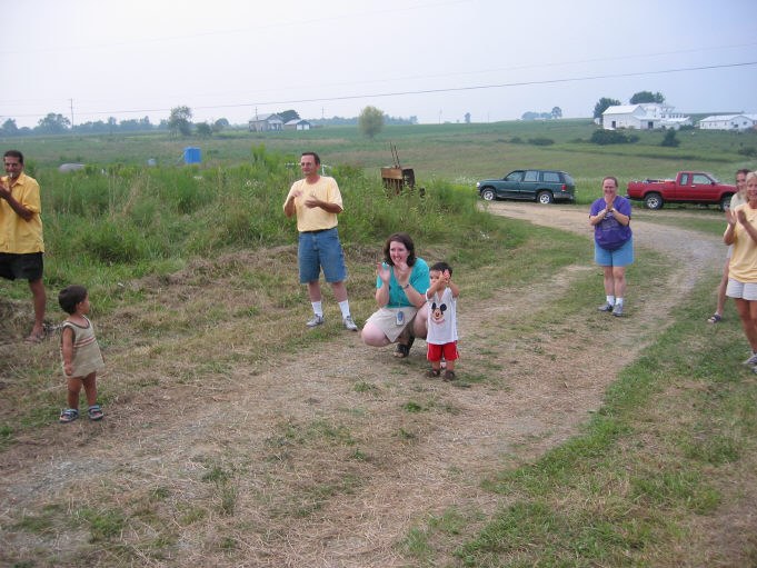 Family cheers in their runner